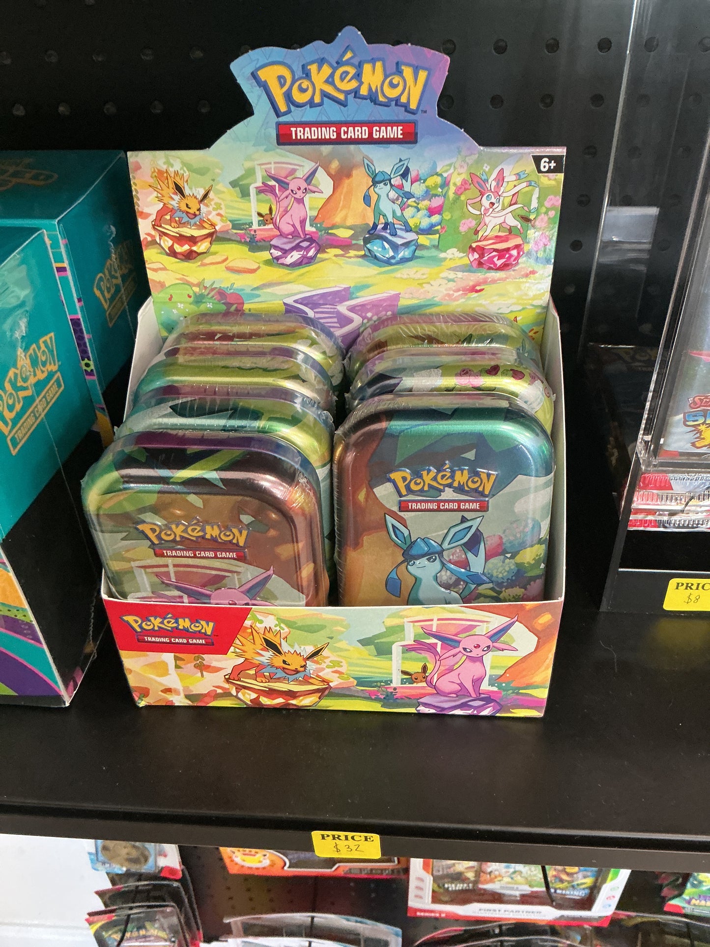 Prismatic Evolutions Mini Tin