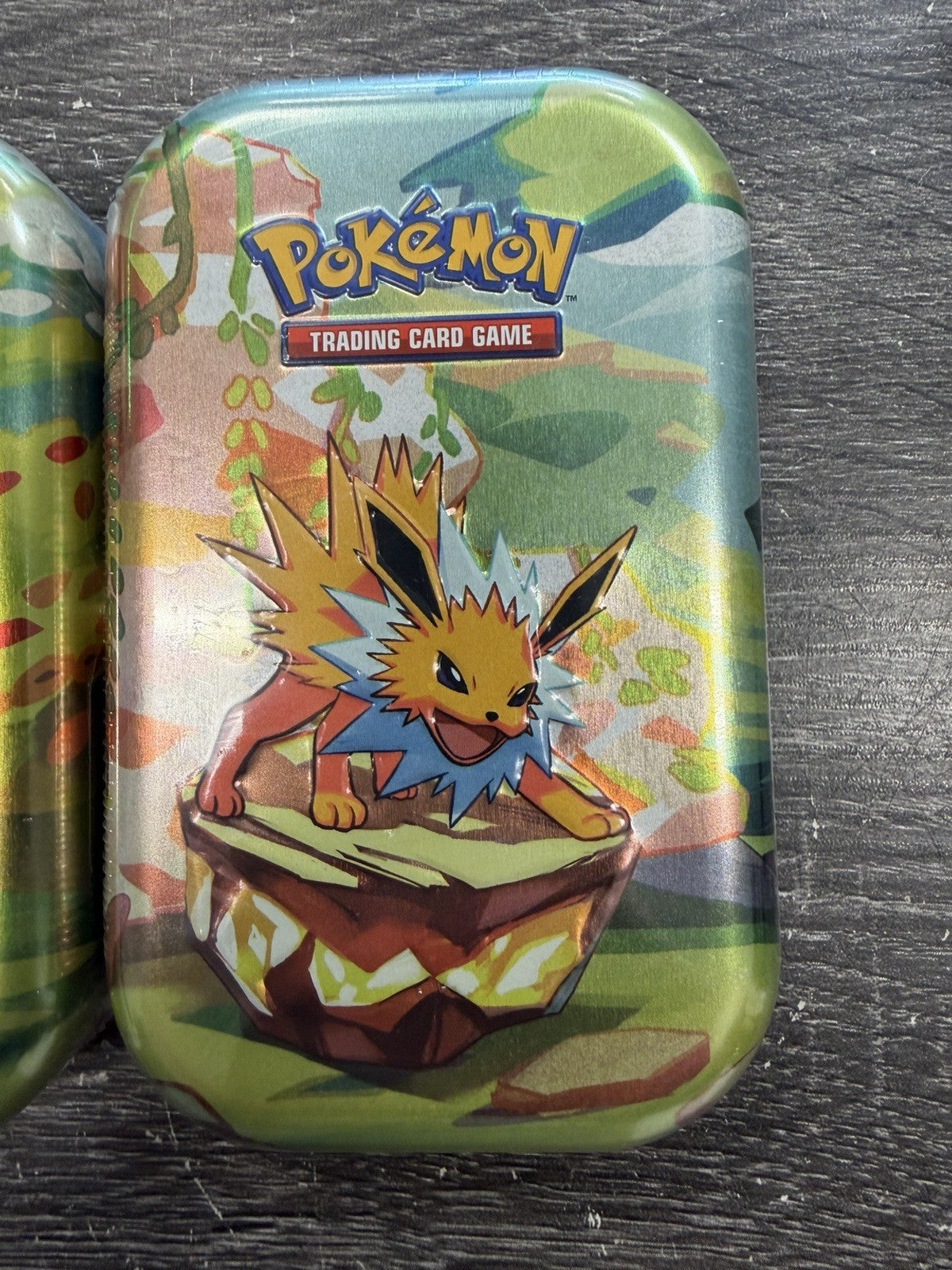 Pokemon PRISMATIC EVOLUTIONS 1 Random  Mini Tins New With Cards Sealed.