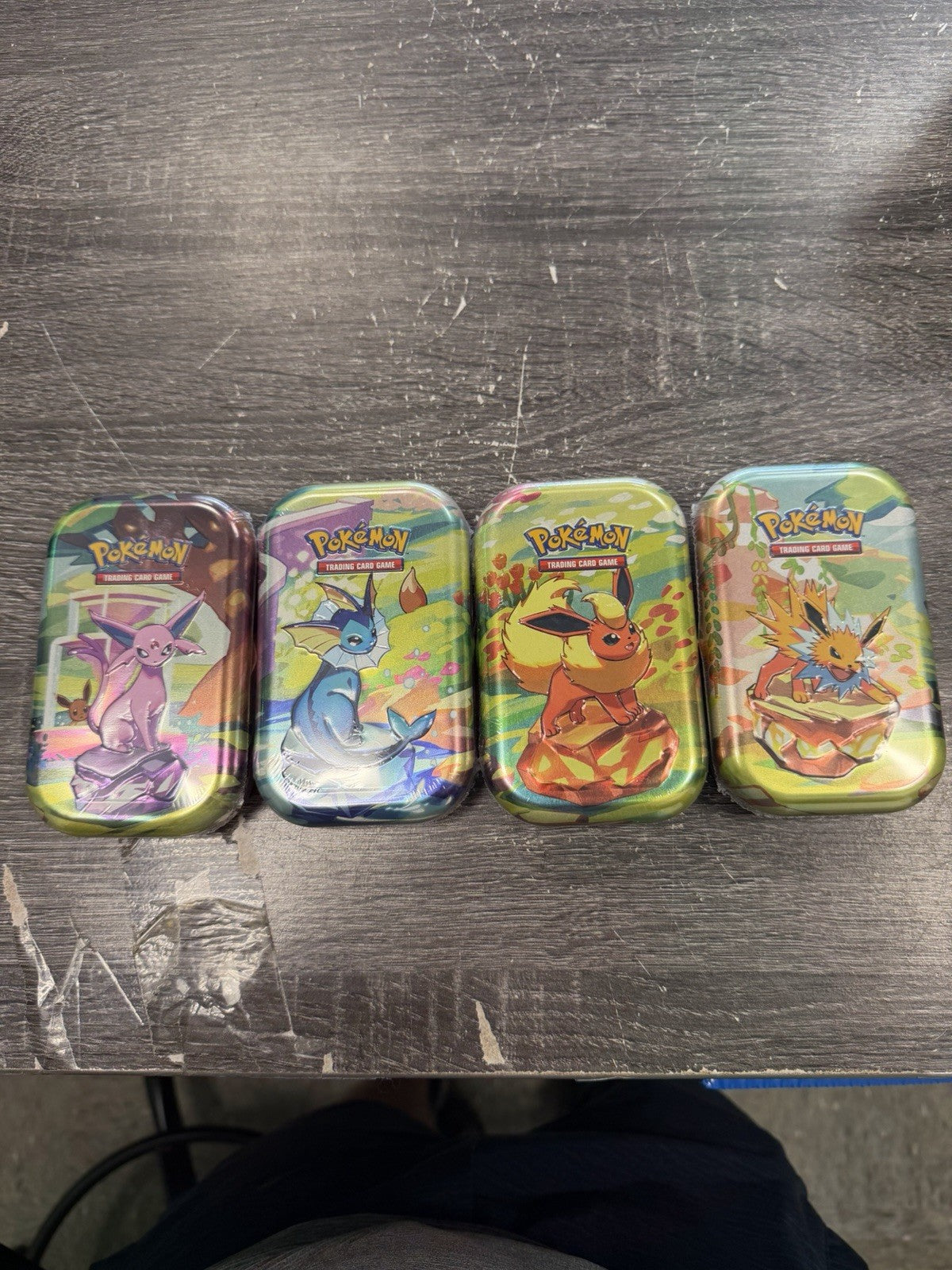 Pokemon PRISMATIC EVOLUTIONS 1 Random  Mini Tins New With Cards Sealed.