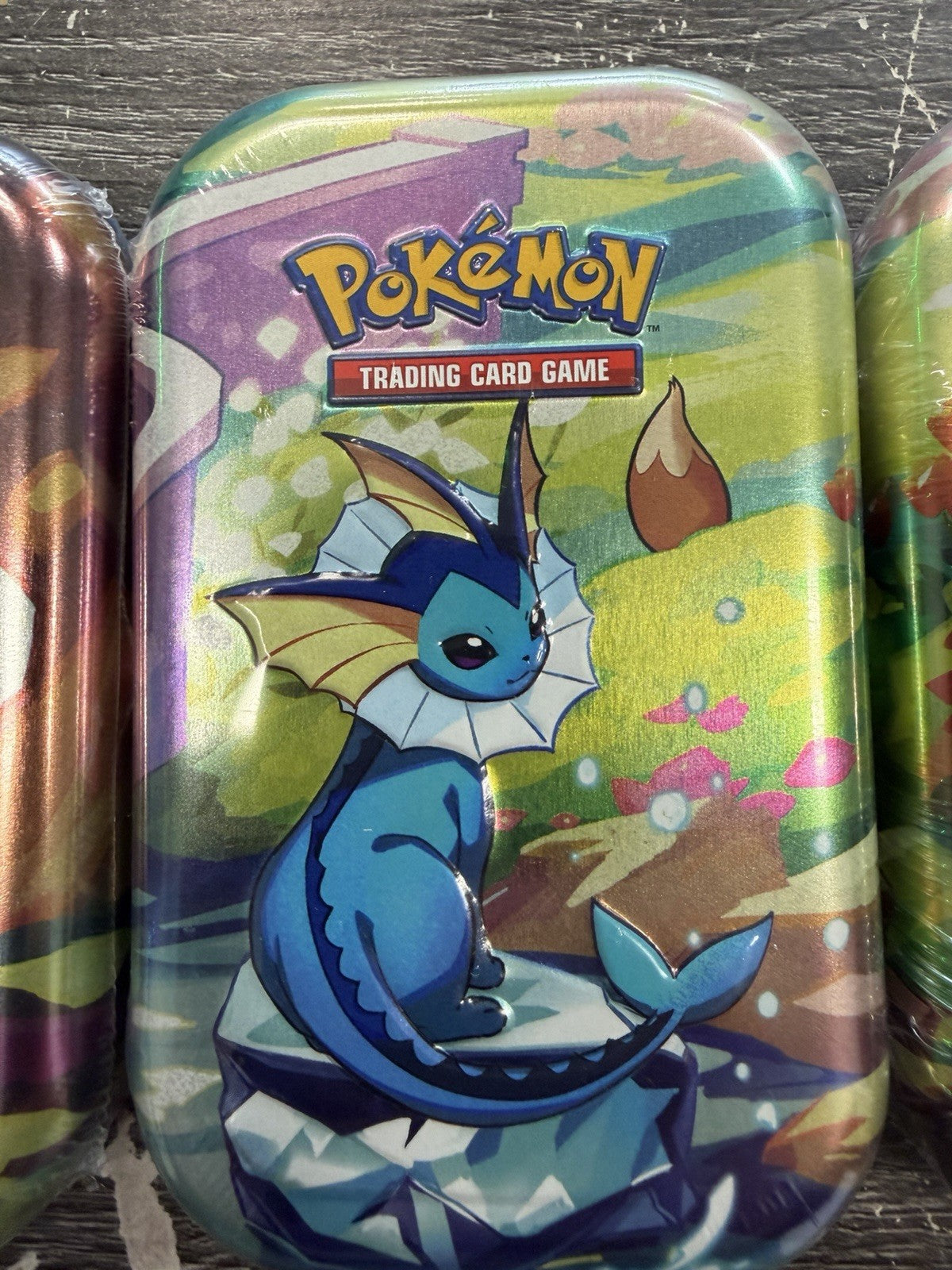 Pokemon PRISMATIC EVOLUTIONS 1 Random  Mini Tins New With Cards Sealed.